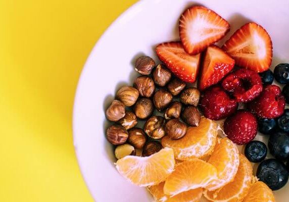 plate full of berries and fruit